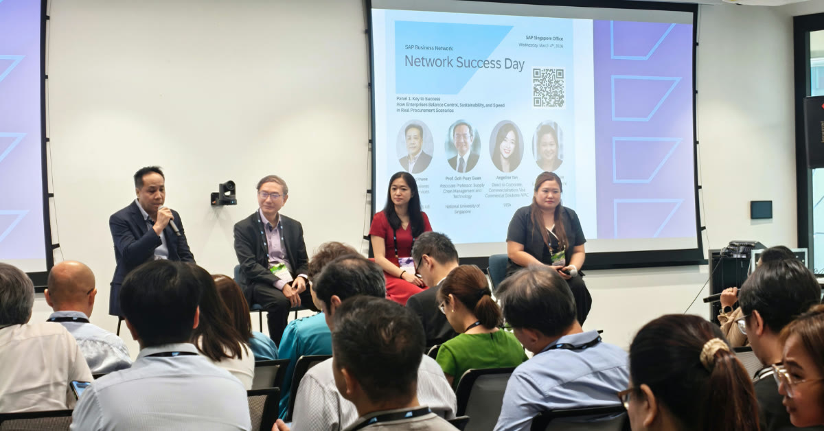 Panel of procurement professionals speaking to an audience
