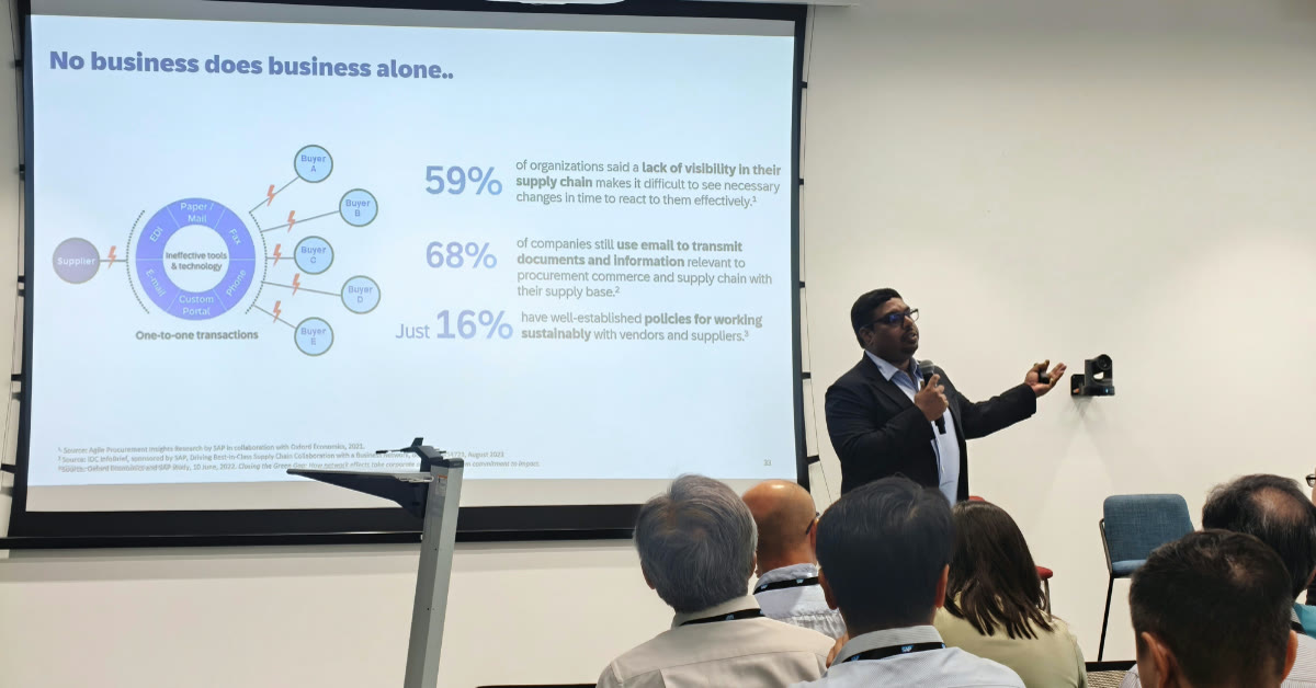 Speaker presenting to an audience during a procurement event